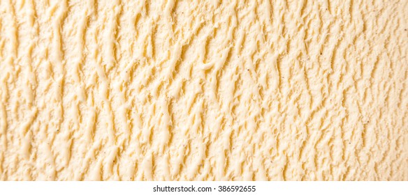 Panoramic Abstract Texture Background - Close Up of Ridges in Surface of Creamy, Sweet and Cold Vanilla Bourbon Frozen Dairy Ice Cream Dessert