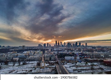 Panoramic Aerial Drone Sunset View To Warsaw City Center During Winter Time With Skyscrapers