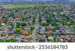 Panoramic aerial drone view of Northern Melbourne Suburbs with Houses roads and parks in Melbourne Victoria Australia