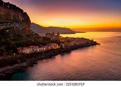 Panoramic aerial drone view of the Cefalù, Sicily, Italy by sunset night. Litttle town in Sicily near Palermo. Travel concept.	