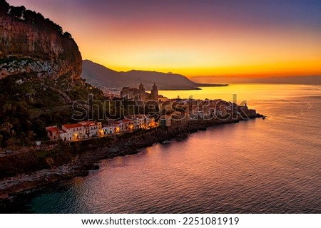 Panoramic aerial drone view of the Cefalù, Sicily, Italy by sunset night. Litttle town in Sicily near Palermo. Travel concept.	