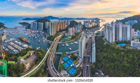 Panoramic Aerial View Of The Aberdeen Harbour (Aberdeen Typhoon Shelter) And Ap Lei Chau Bridge In Hong Kong