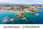 Panoramic aerial view from above of the city of Chania, Crete island, Greece. Landmarks of Greece, beautiful venetian town Chania in Crete island. Chania, Crete, Greece.