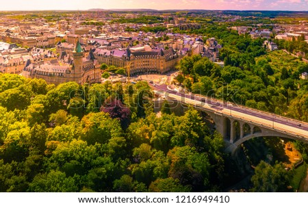 Panoramic aerial view of Adolph bridge, Fort Burbon and Musee de la banque in Luxembourg on a beautiful summer day, Luxembourg