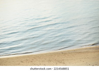 Panoramic Aerial View From The Baltic Sea Shore After The Storm. Clear Sunset Sky, Reflections, Still Water Surface Texture. Nature, Environment. Idyllic Dreamlike Seascape