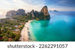 Panoramic aerial view of the beautiful Railay beach, Krabi, Thailand, lush rain forest and emerald sea during morning sunrise without people