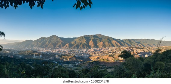 Panoramic aerial view of Caracas during a sunset - Powered by Shutterstock