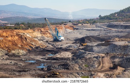 Panoramic aerial view of coal mine. Open pit mine industry, big yellow mining truck for coal quarry. Open coal mining anthracite mining. Pit on coal mining by open way.  - Shutterstock ID 2187872665