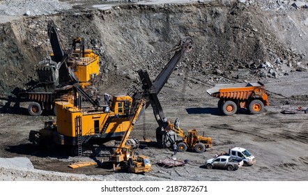 Panoramic aerial view of coal mine. Open pit mine industry, big yellow mining truck for coal quarry. Open coal mining anthracite mining. Pit on coal mining by open way.  - Shutterstock ID 2187872671