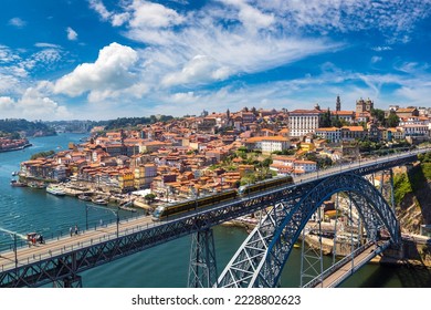 Panoramic aerial view of Dom Luis Bridge in Porto in a beautiful summer day, Portugal - Powered by Shutterstock