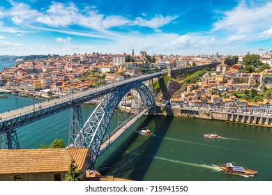 Panoramic aerial view of Dom Luis Bridge in Porto in a beautiful summer day, Portugal - Powered by Shutterstock