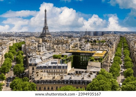 Panoramic aerial view of Eiffel Tower and Paris from Arc de Triomphe in a summer day, France