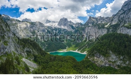 Similar – Image, Stock Photo Aerial view of Gosau lake and Dachstein summit mountain range and visible glacier ice during summertime, Upper-Austria, Europe