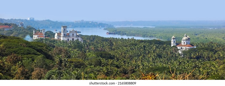 Panoramic aerial view of historic buildings in Goa, India. Including The Church of St. Cajetan and Se Cathedral de Santa Catarina viewed from Monte hill, Selective focus.