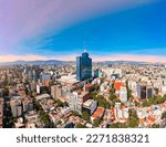 Panoramic aerial view of the iconic building of the World Trade Center in Mexico City on a day with a beautiful sunset