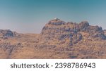 Panoramic aerial view of Jabal Harun mountain with the tomb of Saint Aaron on top, Wadi Rum desert, Jordan