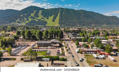 Panoramic Aerial View Of Jackson Hole Homes And Beautiful Mountains On A Summer Morning, Wyoming.