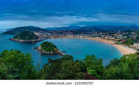 Panoramic aerial view of La Concha bay and beach from Monte Igueldo in San Sebastian Donostia at sunset, the Basque Country of Spain