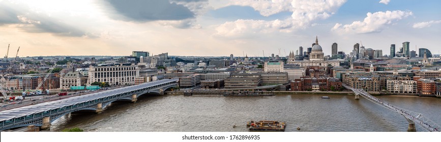 panoramic Aerial view of London St Paul's Cathedral with London Millennium Bridge in London England UK - Powered by Shutterstock