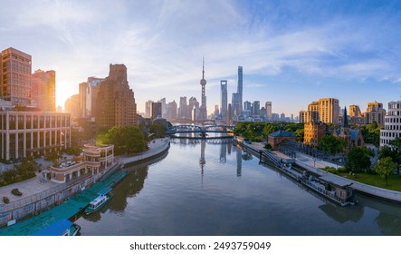 Panoramic aerial view of modern city skyline and buildings at sunrise in Shanghai. - Powered by Shutterstock