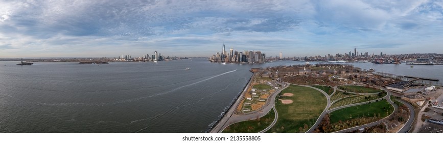 Panoramic aerial view of New York Harbor with Newark, Statue of Liberty, Governors Island, Manhattan, Brooklyn