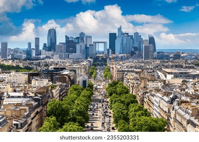 Panoramic aerial view of Paris and The Avenue Charles de Gaulle and business district of La Defence from Arc de Triomphe, France