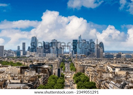 Panoramic aerial view of Paris and The Avenue Charles de Gaulle and business district of La Defence, France