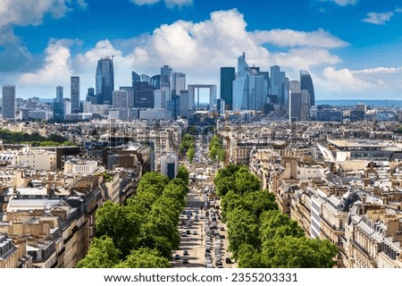 Panoramic aerial view of Paris and The Avenue Charles de Gaulle and business district of La Defence from Arc de Triomphe, France