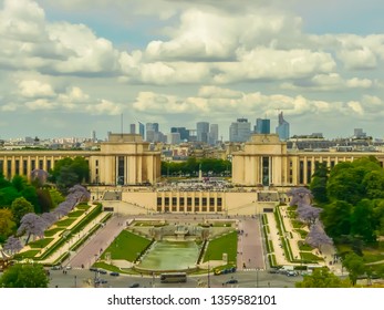 Panoramic aerial view of Paris, France with Trocadéro Gardens Palais de Chaillot and La Defense from Eiffel Tower on a sunny day. Beautiful wide view of the capital of France, Paris with a cloudy sky. - Powered by Shutterstock