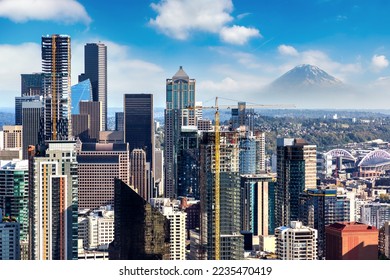 Panoramic aerial view of Seattle business district with Mount Rainier in the background in a sunny day in Seattle, USA - Powered by Shutterstock