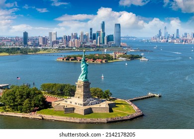 Panoramic aerial view Statue of Liberty and Jersey City and Manhattan cityscape in New York City, NY, USA - Shutterstock ID 2142178205
