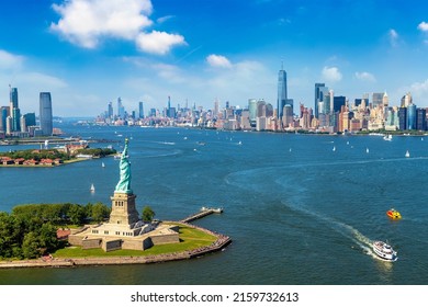 Panoramic aerial view Statue of Liberty and Jersey City and Manhattan cityscape in New York City, NY, USA - Shutterstock ID 2159732613
