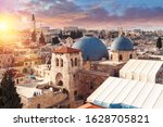 Panoramic aerial view of the Temple of the Holy Sepulcher at sunset in the old city of Jerusalem, Christian quarter, Israel