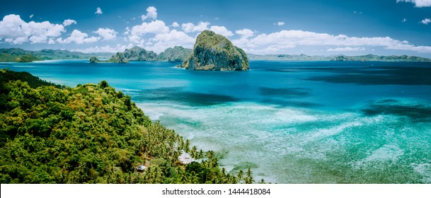 Panoramic aerial view of tropical Palawan island with unique Pinagbuyutan island on horizon. El Nido-Philippines Southeast Asia Bacuit archipelago
