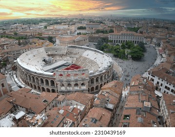 Panoramic aerial view of Verona at sunset with the Verona Arena in the center. Veneto, Italy