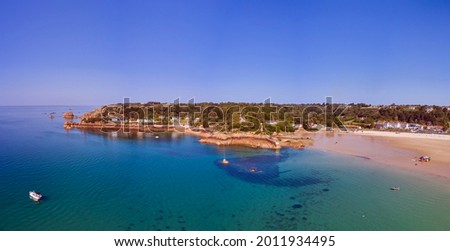 Panoramic airial image of St Brelades Bay at half tide in the sunshine. Jersey Channel Islands