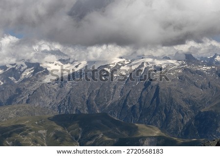 Panoramic alpine viewpoint from Pic Blanc at 3300 meters near Alpe d’Huez in the Grandes Rousses massif, French Alps