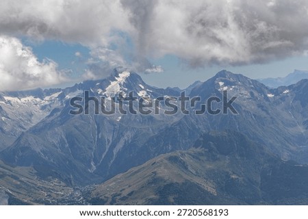 Panoramic alpine viewpoint from Pic Blanc at 3300 meters near Alpe d’Huez in the Grandes Rousses massif, French Alps