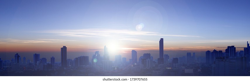Panoramic Bangkok city in sunrise modern buildings, city background, urban view, banner background for business concept, blue purple colour, shining bright light like a good future.