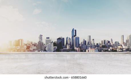 Panoramic Bangkok City In Sunrise Modern Buildings, And Concrete Deck Floor. City Background