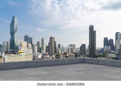 Panoramic Bangkok skyline view, concrete observatory deck on rooftop, daytime. Luxury Asian corporate and residential lifestyle. Financial city downtown, real estate. Product display mockup empty roof - Shutterstock ID 2068055006