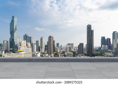 Panoramic Bangkok skyline view, concrete observatory deck on rooftop, daytime. Luxury Asian corporate and residential lifestyle. Financial city downtown, real estate. Product display mockup empty roof - Shutterstock ID 2089275325