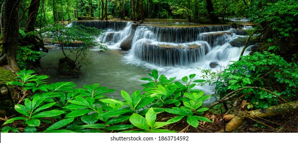 Panoramic beautiful deep forest waterfall in Thailand.