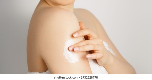 Panoramic Beauty Banner.Young Woman In Towel After Shower Applying A Body Cream. Skin Care.