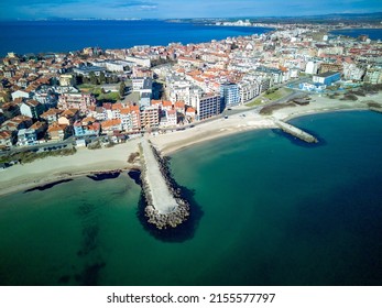 Panoramic bird's eye view over small ancient resort town of Pomorie with old European small houses and quiet calm empty streets, washed by the sea spring turquoise Black Sea on clear day in Bulgaria - Shutterstock ID 2155577797