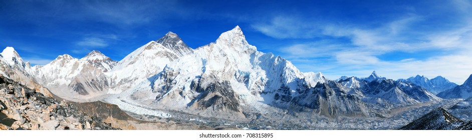 Panoramic blue colored view of himalayas mountains, Mount Everest and Khumbu Glacier from Kala Patthar - way to Everest base camp, Khumbu valley, Sagarmatha national park, Nepalese himalayas
