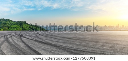 Similar – Image, Stock Photo Asphalt road in a rural landscape