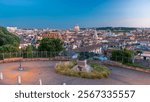 Panoramic cityscape view from the Pincio Landmark day to night transition aerial timelapse in Rome, Italy on a beautiful warm spring evening