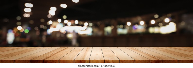 Panoramic Clean Wood Counter Table Top On Blur Street Night Cafe Background Pub Coffee Desk Shop Montage Dark Scene, Blurry Wide Wooden Texture Shelf Bar In Luxury Restaurant Food Kitchen Backdrop