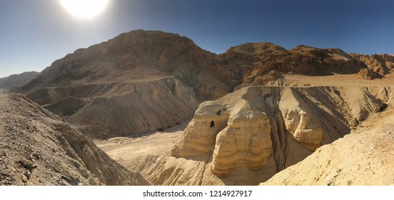 Panoramic Desert Mountain Landscape with the Sun shining in the Blue Sky -  Near The Dead Sea in The West Bank Of The Jordan River where The Dead Sea Scrolls were found